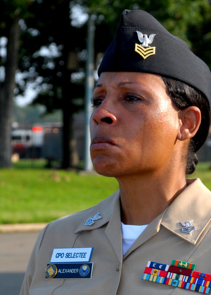 US Navy 110911-N-FJ200-022 Chief Petty Officer (Select) Treva Anderson cries while listening to a Sept. 11, 2001 commemoration at Joint Base Andrew photo