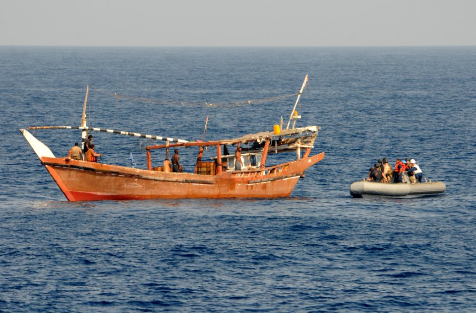 US Navy 110915-N-XQ375-184 Sailors from the guided-missile destroyer USS Mitscher (DDG 57) and members of a Coast Guard advanced interdiction team