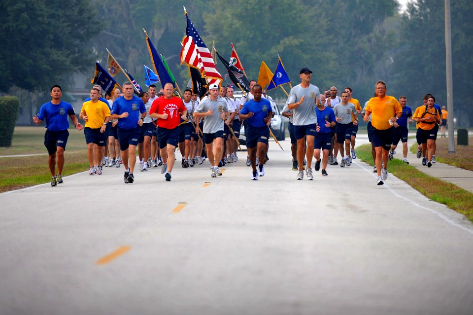 US Navy 110909-N-YR391-006 Chief selects, along with chief petty officers run in formation during the 10th anniversary 9-11 Memorial 5K run at NAS