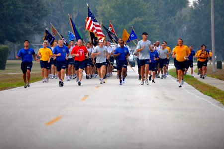 US Navy 110909-N-YR391-006 Chief selects, along with chief petty officers run in formation during the 10th anniversary 9-11 Memorial 5K run at NAS photo