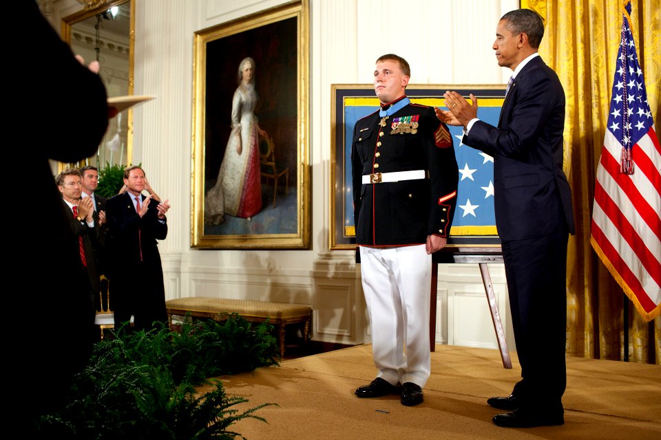 US Navy 110915-N-ZZ999-013 President Barack Obama applauds after awarding the Medal of Honor to former Marine Corps Sgt. Dakota Meyer