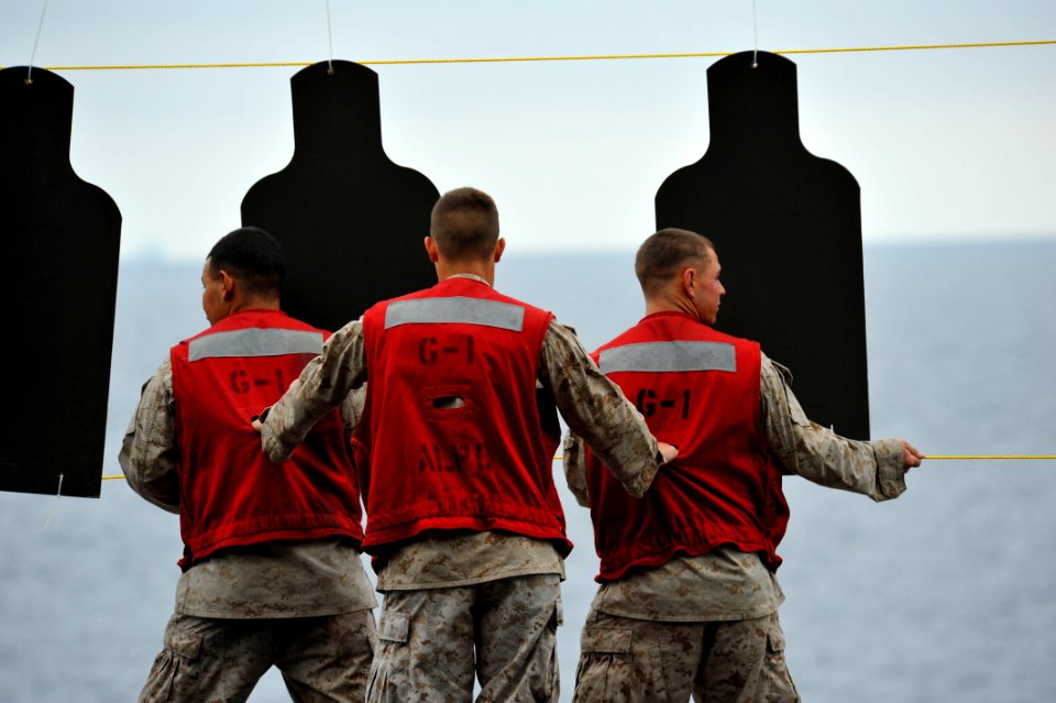 US Navy 110910-N-KS651-180 Marines assigned to the 11th Marine Expeditionary Unit (11th MEU) prepare the range for a live-fire exercise aboard the