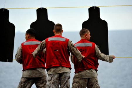 US Navy 110910-N-KS651-180 Marines assigned to the 11th Marine Expeditionary Unit (11th MEU) prepare the range for a live-fire exercise aboard the