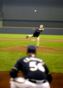 US Navy 110913-N-AC887-007 Secretary of the Navy (SECNAV) Ray Mabus throws the ceremonial first pitch before the Milwaukee Brewers basesball game a