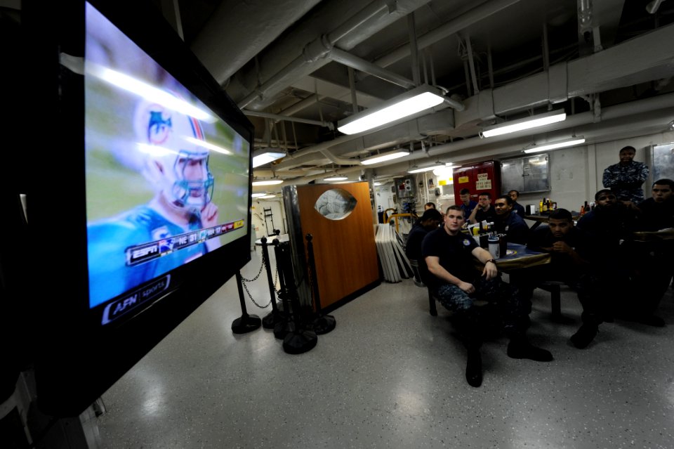 US Navy 110913-N-OY799-007 Sailors watch Monday Night Football on the mess decks aboard the Nimitz-class aircraft carrier USS John C. Stennis (CVN