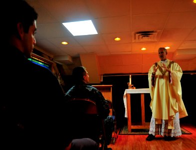 US Navy 110915-N-MH885-030 Bishop Richard Spencer, a senior cleric of the Archdiocese for the Military Services, delivers a sermon to Sailors