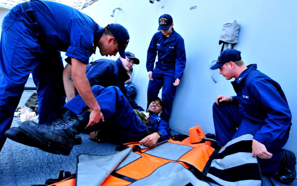 US Navy 110913-N-ZF681-100 Sailors participate in a mass casualty drill aboard the guided-missile destroyer USS Halsey (DDG 97)