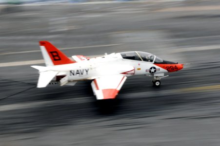 US Navy 110919-N-AU622-072 A T-45C Goshawk training aircraft makes an arrested landing aboard the aircraft carrier USS Dwight D. Eisenhower (CVN 69