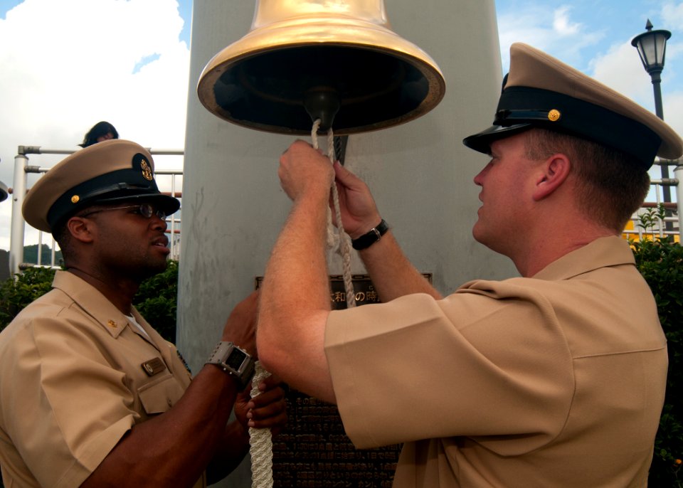 US Navy 110919-N-EA192-057 Chief Boatswain's Mate Adam Melancon, right, and Chief Ship's Serviceman Warren Brown splice a lanyard to a