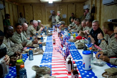 US Navy 110920-N-AC887-085 Secretary of the Navy (SECNAV) the Honorable Ray Mabus shares eats with Sailors and Marines at Forward Operating Base Ze