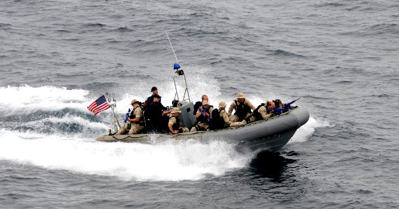 US Navy 110920-N-BC134-027 Members of the visit, board, search and seizure team assigned to the guided-missile cruiser USS Bunker Hill (CG 52) photo