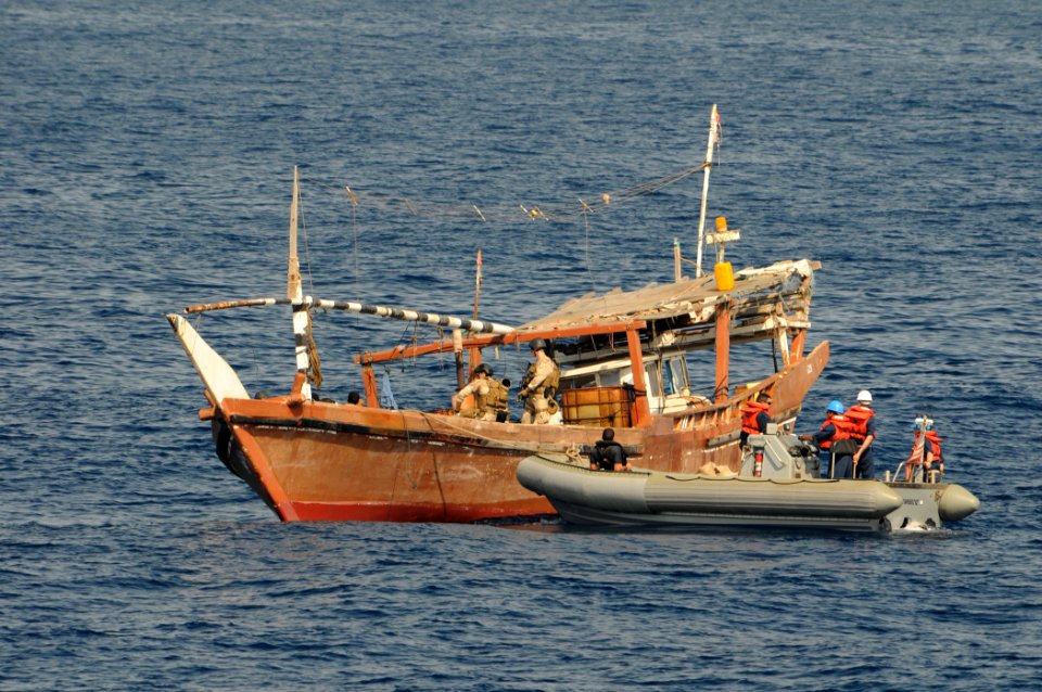 US Navy 110915-N-XQ375-309 Sailors from the guided-missile destroyer USS Mitscher (DDG 57) and members of a Coast Guard advanced interdiction team
