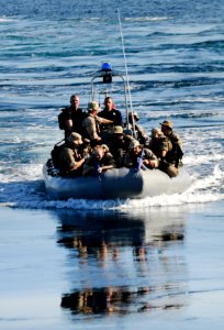 US Navy 110917-N-BC134-239 Members of the visit, board, search and seizure team assigned to the guided-missile cruiser USS Bunker Hill (CG 52) photo