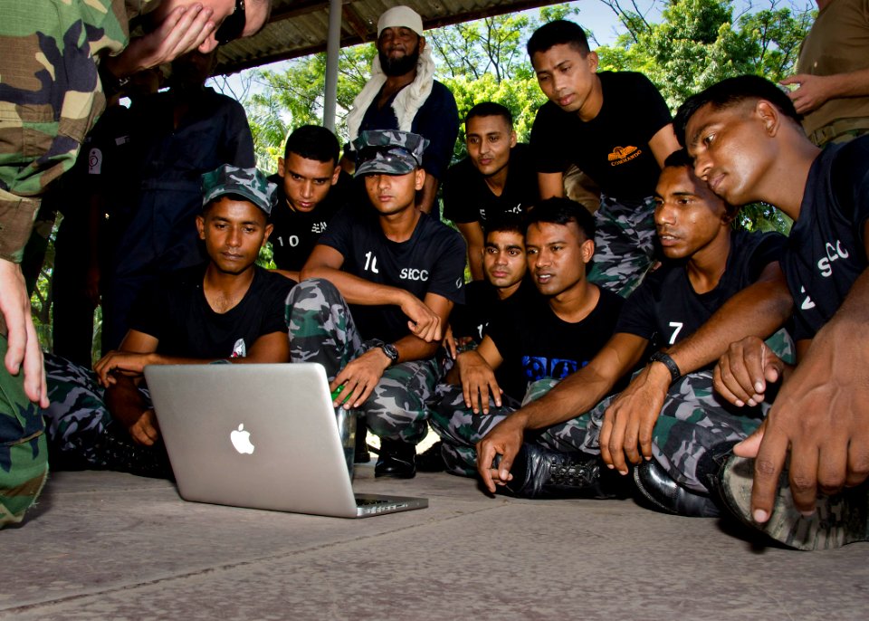 US Navy 110920-N-RI884-493 Bangladesh navy small boat team members observe training videos provided by Lt. j.g. Gordan Van Hook, far left