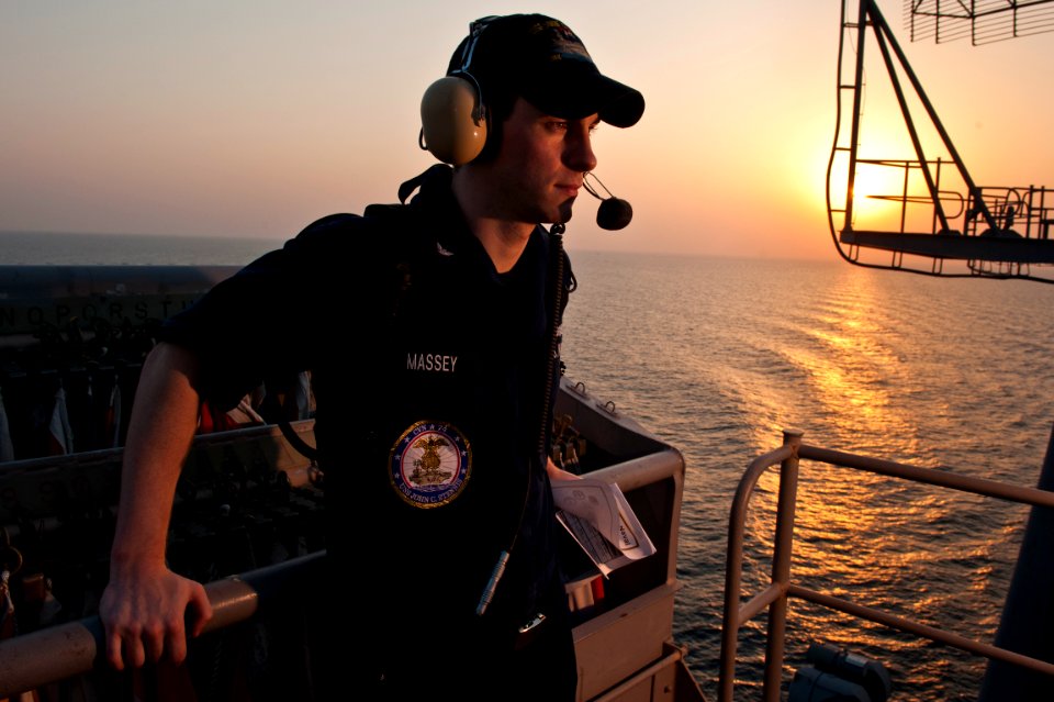 US Navy 110920-N-BT887-085 Intelligence Specialist 3rd Class Ross Massey, from Dunlap, Ill., stands an intelligence watch during a transit of the S