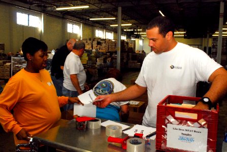 US Navy 110921-N-GO179-002 Brian Martin, left, privacy officer for Navy Medicine Support Command (NMSC), and Hospital Corpsman 1st Class Teresa Ada photo