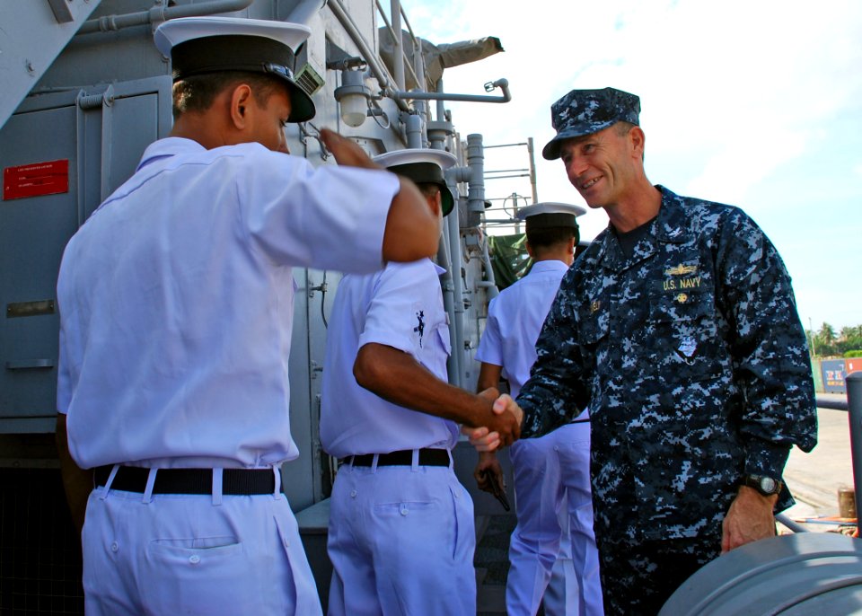 US Navy 110920-N-VP123-009 Capt. Wallace Lovely, deputy commodore of Destroyer Squadron (DESRON) 31, welcomes Bangladesh navy sailors