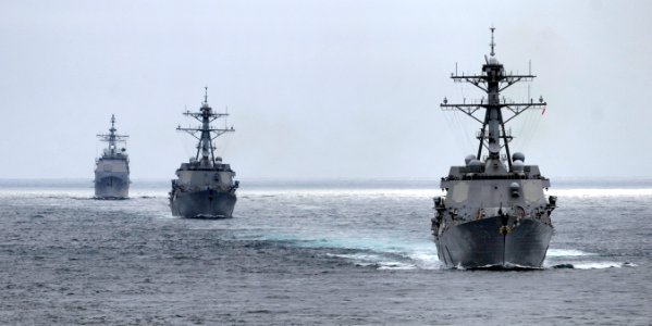 US Navy 110921-N-GZ277-066 The Arleigh Burke-class guided-missile destroyer USS Stockdale (DDG 106), right, USS Halsey (DDG 97) and the Ticonderoga