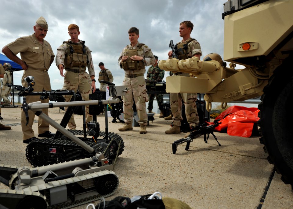 US Navy 110920-N-YO394-112 Rear Adm. Kurt Tidd speaks with members of Explosive Ordnance Disposal Mobile Unit (EODMU) 6
