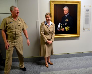 US Navy 110922-N-FC670-004 Chief of Naval Operations (CNO) Adm. Gary Roughead and his daughter, Elizabeth, reveal Roughead's official CNO portrait