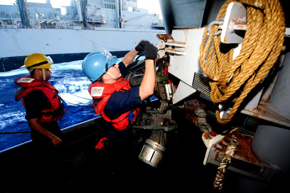 US Navy 110923-N-JO245-023 Sailors prepare a fuel receiving station for refueling