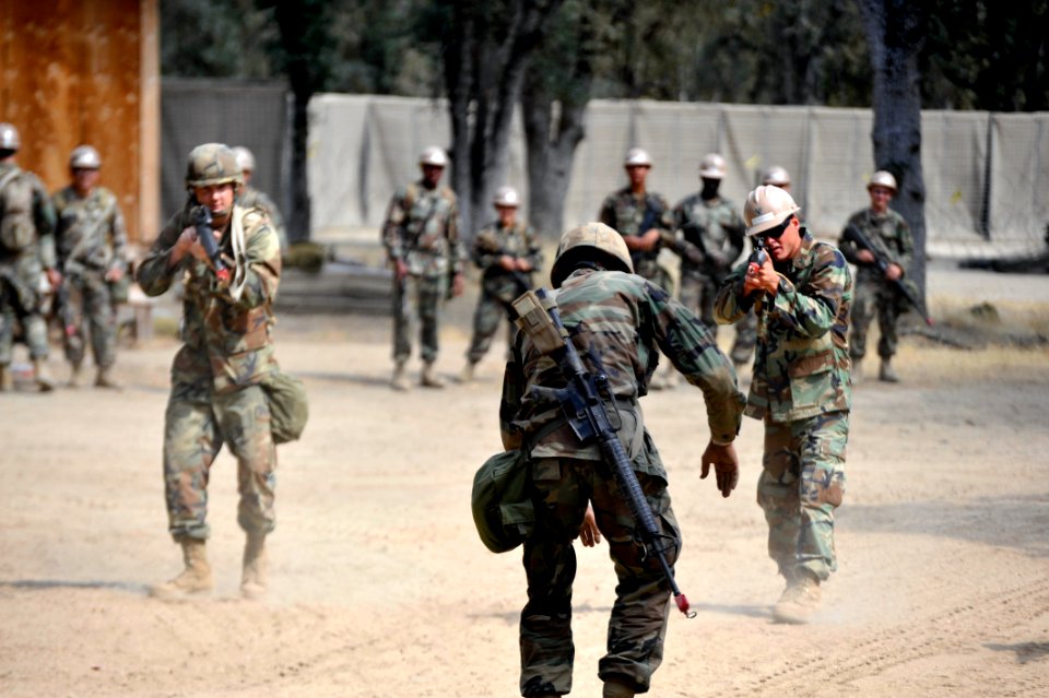 US Navy 110924-N-SM578-051 Seabees assigned to Naval Mobile Construction Battalion (NMCB) 40, Bravo Company, practice take down exercises during ru