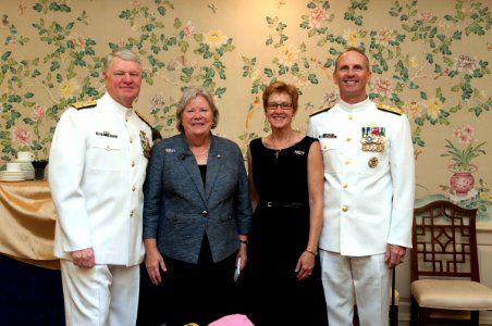 US Navy 110923-N-ZB612-717 Chief of Naval Operations (CNO) Adm. Gary Roughead and his wife, Ellen, pose for a photo with Adm. Jonathan W. Greenert