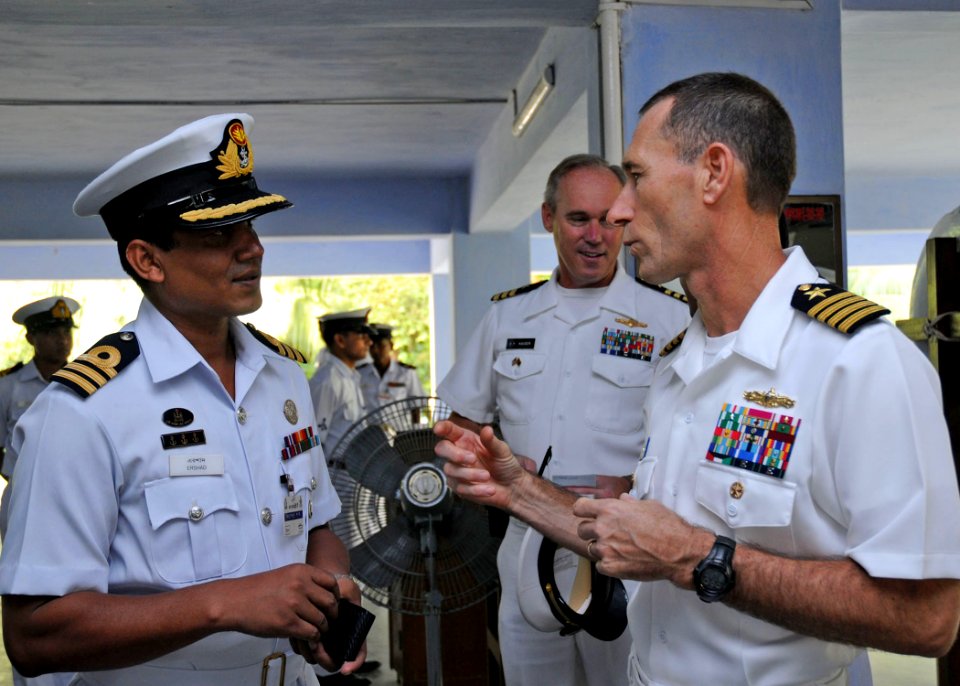 US Navy 110924-N-KK935-017 Capt. Wallace Lovely, deputy commodore of Task Group 73.1, speaks with Bangladesh navy Cmdr. Ershad after a review of ev