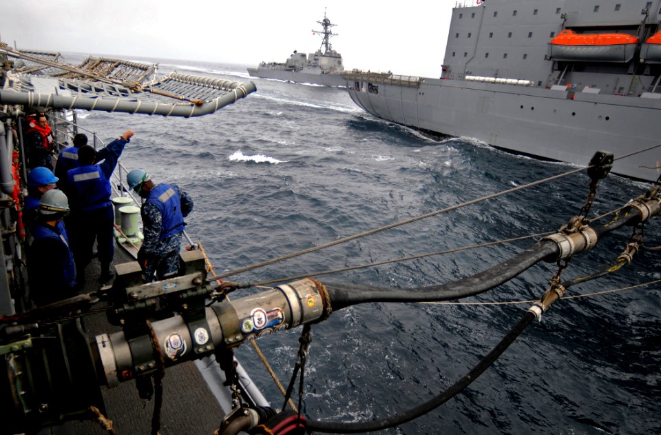 US Navy 110927-N-BC134-078 Sailors aboard the guided-missile cruiser USS Bunker Hill (CG 52) stand by during a underway replenishment with the Flee
