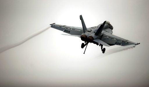US Navy 110923-N-TU221-199 An F-A-18E Super Hornet assigned to Strike Fighter Squadron (VFA) 137 launches from the Nimitz-class aircraft carrier US