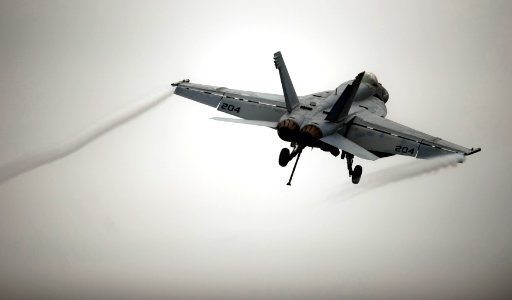 US Navy 110923-N-TU221-199 An F-A-18E Super Hornet assigned to Strike Fighter Squadron (VFA) 137 launches from the Nimitz-class aircraft carrier US photo