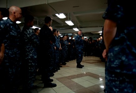 US Navy 110926-N-DR144-111 Vice Adm. Gerald R. Beaman speaks to Sailors during an all-hands call on the mess decks aboard USS Carl Vinson (CVN 70) photo