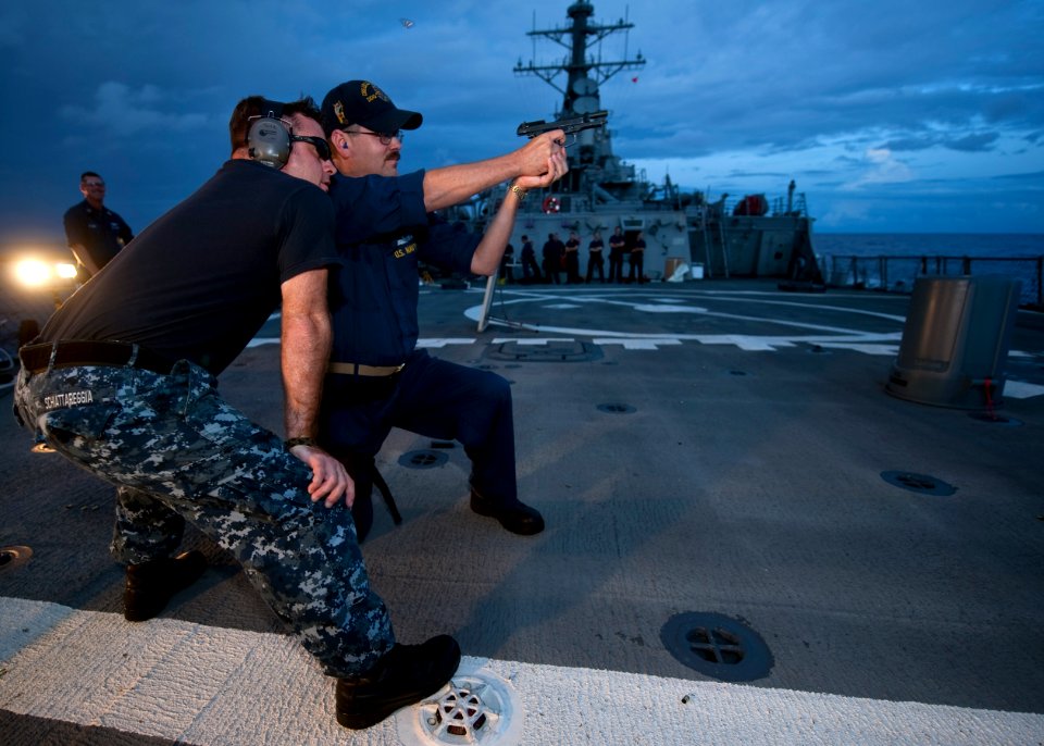 US Navy 110924-N-FI736-198 Sailors aboard the guided-missile destroyer USS Arleigh Burke (DDG 51) participate in a live-fire training exercise