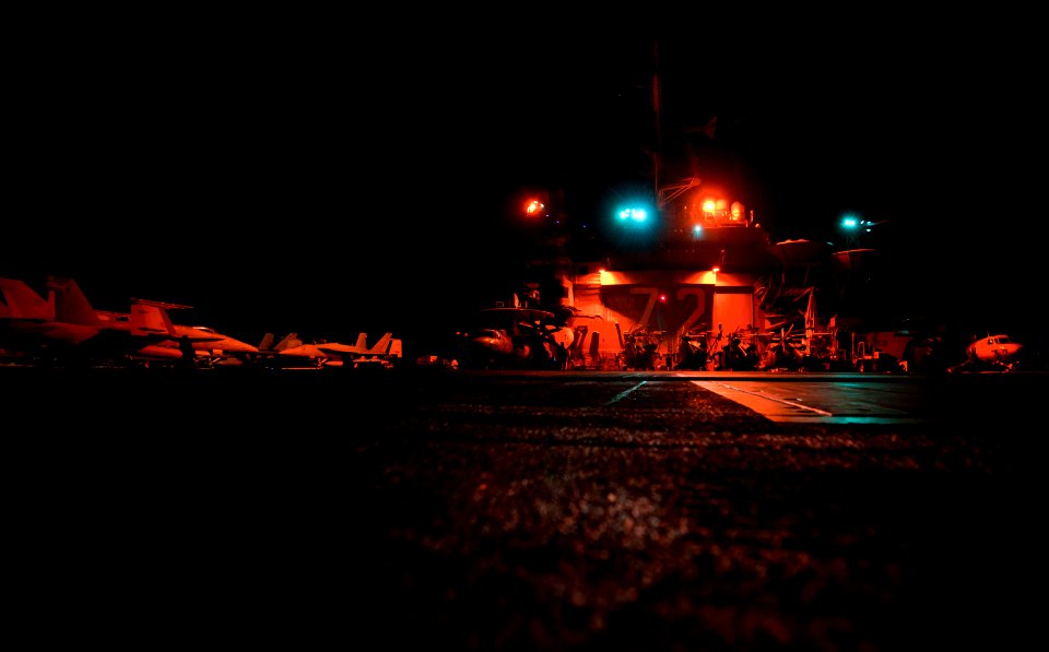 US Navy 110926-N-TU221-029 Aircraft are chocked and chained to the flight deck of USS Abraham Lincoln (CVN 72)