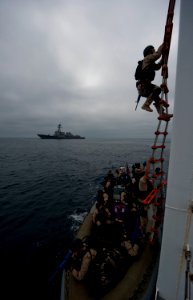 US Navy 110928-N-TU221-579 Sailors assigned to the visit, board, search and seizure team assigned to the Arleigh Burke-class guided-missile destroy