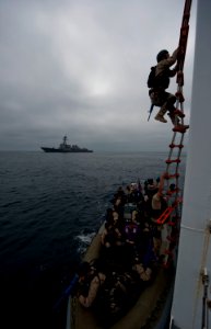 US Navy 110928-N-TU221-579 Sailors assigned to the visit, board, search and seizure team assigned to the Arleigh Burke-class guided-missile destroy photo