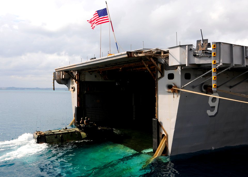 US Navy 110924-N-WJ771-076 Marines assigned to the 31st Marine Expeditionary Unit (31st MEU) pilot an amphibious assault vehicle into the well deck