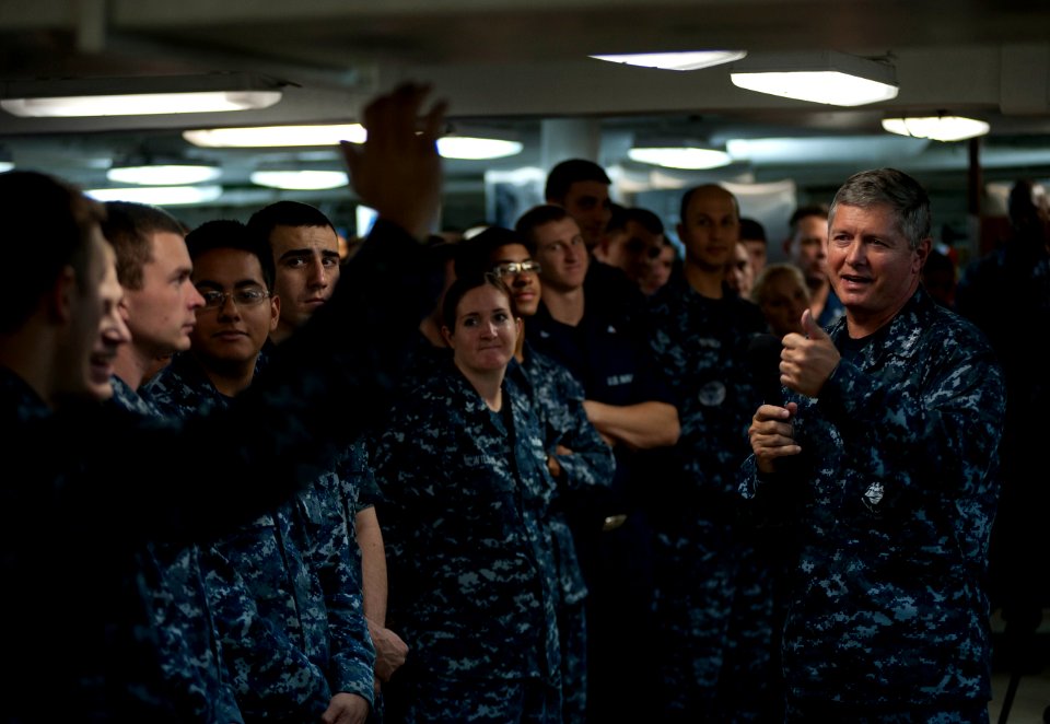 US Navy 110926-N-DR144-172 Vice Adm. Gerald R. Beaman speaks to Sailors during an all-hands call on the mess decks aboard USS Carl Vinson (CVN 70)