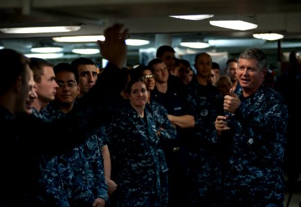 US Navy 110926-N-DR144-172 Vice Adm. Gerald R. Beaman speaks to Sailors during an all-hands call on the mess decks aboard USS Carl Vinson (CVN 70)