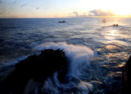 US Navy 110929-N-WJ771-096 An amphibious assault vehicle assigned to the 31st Marine Expeditionary Unit (31st MEU) disembarks the well deck of the