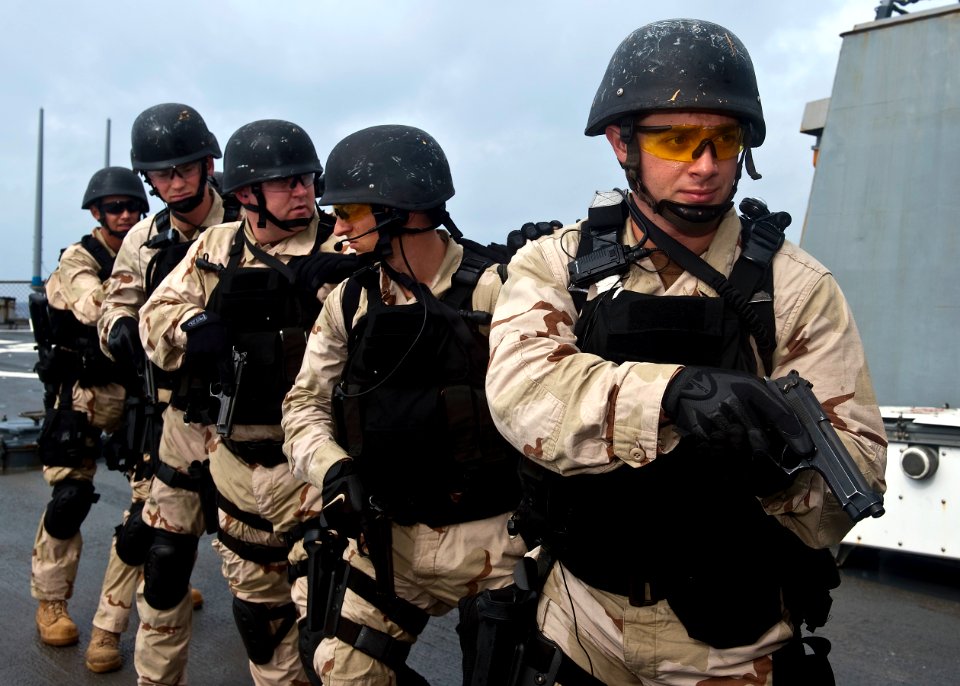 US Navy 110927-N-FI736-143 Sailors assigned to the visit, board, search and seizure (VBSS) team aboard guided-missile destroyer USS Arleigh Burke (