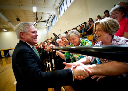 US Navy 110928-N-AC887-002 Secretary of the Navy (SECNAV) the Honorable Ray Mabus greets former Ackerman High School classmates