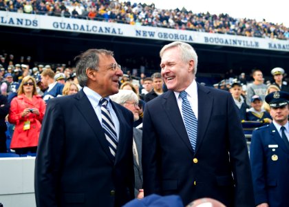 US Navy 111001-N-AC887-002 Secretary of the Navy (SECNAV) Ray Mabus and Secretary of Defense (SECDEF) Leon Panetta prepare to take the field for th photo