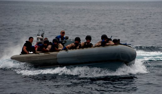 US Navy 110928-N-TU221-316 Sailors assigned to the visit, board, search and seizure team assigned to the Arleigh Burke-class guided-missile destro