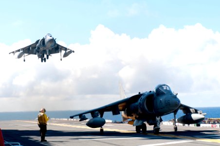 US Navy 110929-N-ER662-094 An AV-8B Harrier assigned to Marine Attack Squadron (VMA) 214, lands on the flight deck of the forward-deployed amphibio