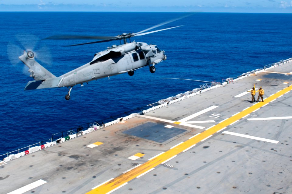 US Navy 110929-N-ER662-064 An MH-60S Sea Hawk helicopter assigned to the Island Knights of Helicopter Sea Combat Squadron (HSC) 25 takes off from t
