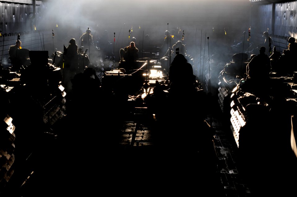 US Navy 110929-N-WJ771-002 Marines assigned to the 31st Marine Expeditionary Unit (31st MEU) prepare to pilot amphibious assault vehicles out of th