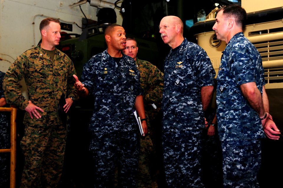 US Navy 110929-N-WA347-040 Capt. Bradley Lee and Capt. David Fluker speaks with Vice Adm. Scott H. Swift
