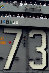 US Navy 110929-N-WW409-010 Sailors man the rails aboard the aircraft carrier USS George Washington (CVN 73) as the ship arrives in Busan, Republic