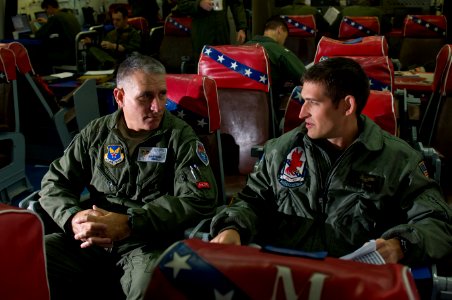 US Navy 110928-N-TZ605-025 Air Force Col. James Boyd, left, senior medical officer aboard the aircraft carrier USS Carl Vinson (CVN 70)